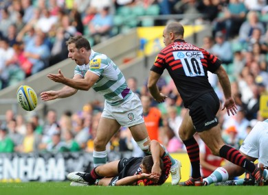 Tomás O'Leary spins a pass against Saracens.