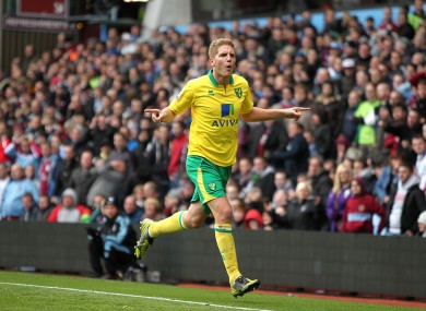Norwich City's Michael Turner celebrates scoring his side's first goal of the game.