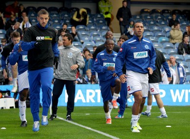 Queens Park Rangers' Anton Ferdinand (right) opted not to wear an anti-rascism t-shirt during pre-match training last week.