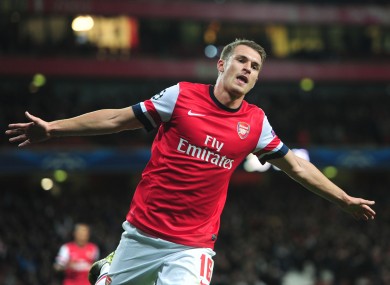 Arsenal's Aaron Ramsey celebrates scoring against Olympiakos.