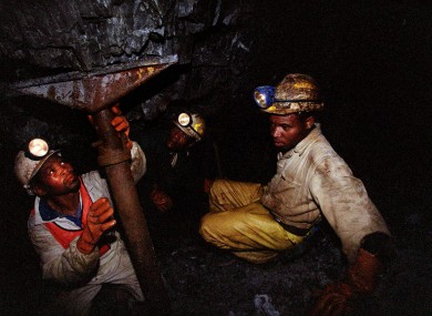 Miners work underground near Carletonville, South Africa (file photo)