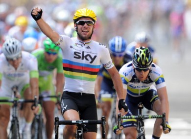 Mark Cavendish next to Australia's Matthew Goss celebrates a Tour de France stage win this summer.