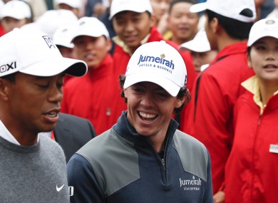 Tiger Woods and his new stablemate, Rory McIlroy.