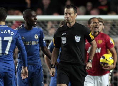Chelsea's Ramires, center left, remonstrates with referee Mark Clattenburg, center right, during their Premier League match against Manchester United at Stamford Bridge.