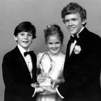 Drew Barrymore, center, Henry Thomas, left, and Robert Macnaughton, the young stars of Steven Spielberg's movie