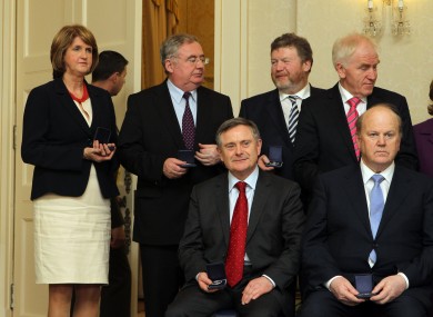 Overspending at the Departments of Joan Burton (back, left) and James Reilly (back, second from right) meant Brendan Howlin and Michael Noonan (front row) needed to make alternative arrangements.