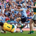 Raising the green flag. Dublin's Bernard Brogan scores his sides first goal of the game. (INPHO/Donall Farmer).