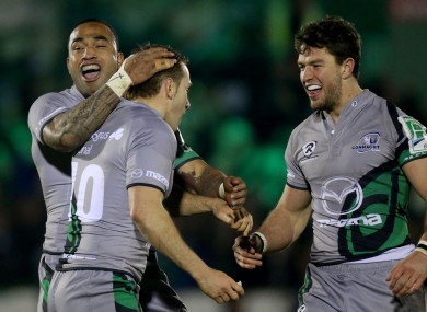 Vainikolo and Poolman celebrate with Parks after his late drop goal.