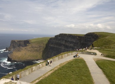 Visitors at the Cliffs of Moher in County Clare.