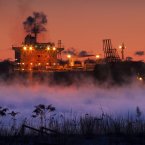 Arctic sea-smoke rises from Portland Harbor where the Bahama-based oil tanker, the Teesta Spirit, unloads it's fuel in South Portland, Maine. A stubborn cold front continues to grip the region. (AP Photo/Robert F. Bukaty)