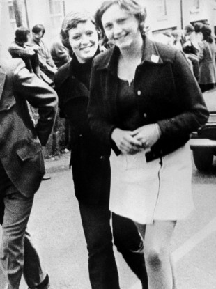In this file photo dated 4 June, 1972 Dolours Price (left) and her sister Marian attend a civil rights demonstration in Belfast, Northern Ireland.