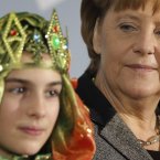 Not impressed with the kid in the crown either. (AP Photo/Michael Sohn)
