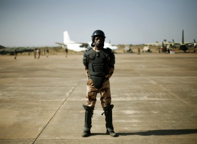 A Mali special forces soldier stands guard at Banako's airport on Wednesday