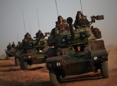 French soldiers patrol in armored vehicles, in the outskirts of Sevare, Mali.