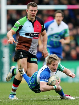 Kieran Marmion tumbles ahead of Nick Easter.