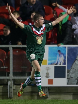 City's Danny Morrissey celebrates scoring.