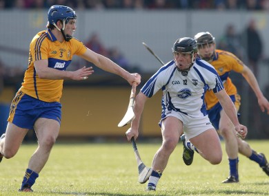 Clare's James McInerney and Waterford's Jake Dillon.