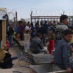 Syrian refugees in Zaatri Refugee Camp, Jordan, wait to receive food parcels.
Photo: Kenneth O'Halloran, Irish Red Cross