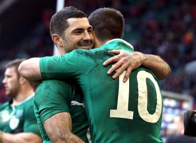 Rob Kearney hugs Jonny Sexton after the 30-22 win.