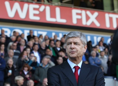 Under pressure: Arsene Wenger.