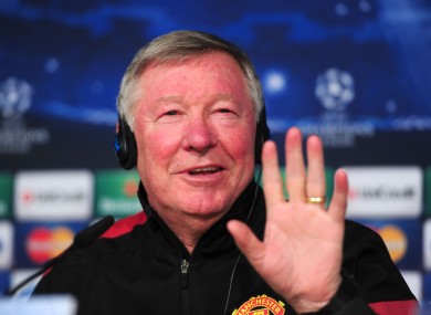 Manchester United's coach Alex Ferguson chats to the press during the press conference at Santiago Bernabeu yesterday.