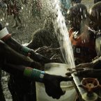 Children play in the borehole fresh water as it is sprayed from a pipe in the village of Nawoyatir in the Lapur district of Lokitaung in Turkana.
Nawoyatir previously had a scoop hole (hand-dug well). ItÃâÃÃÃÃs difficult to keep these wells clean as they are so shallow. People have been leaving Nawoyatir because thereÃâÃÃÃÃs a lack of water. Serious water related illnesses, such as cholera, are common in Turkana.
