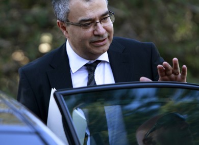 Cyprus Central Bank chief Panicos Demetriades leaves a meeting with the president in Nicosia earlier today