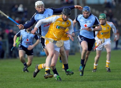 Antrim's Stephen Beatty with Dublin's Liam Rushe.